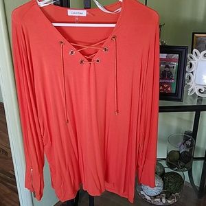 Beautiful orange Calvin Klein shirt